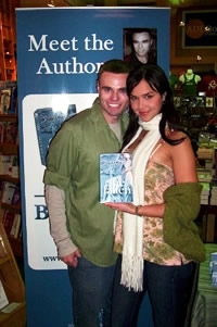 Joshua Dagon with the beautiful Arielle Kebbel.